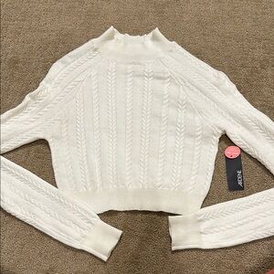 Cropped mock neck cable knit sweater